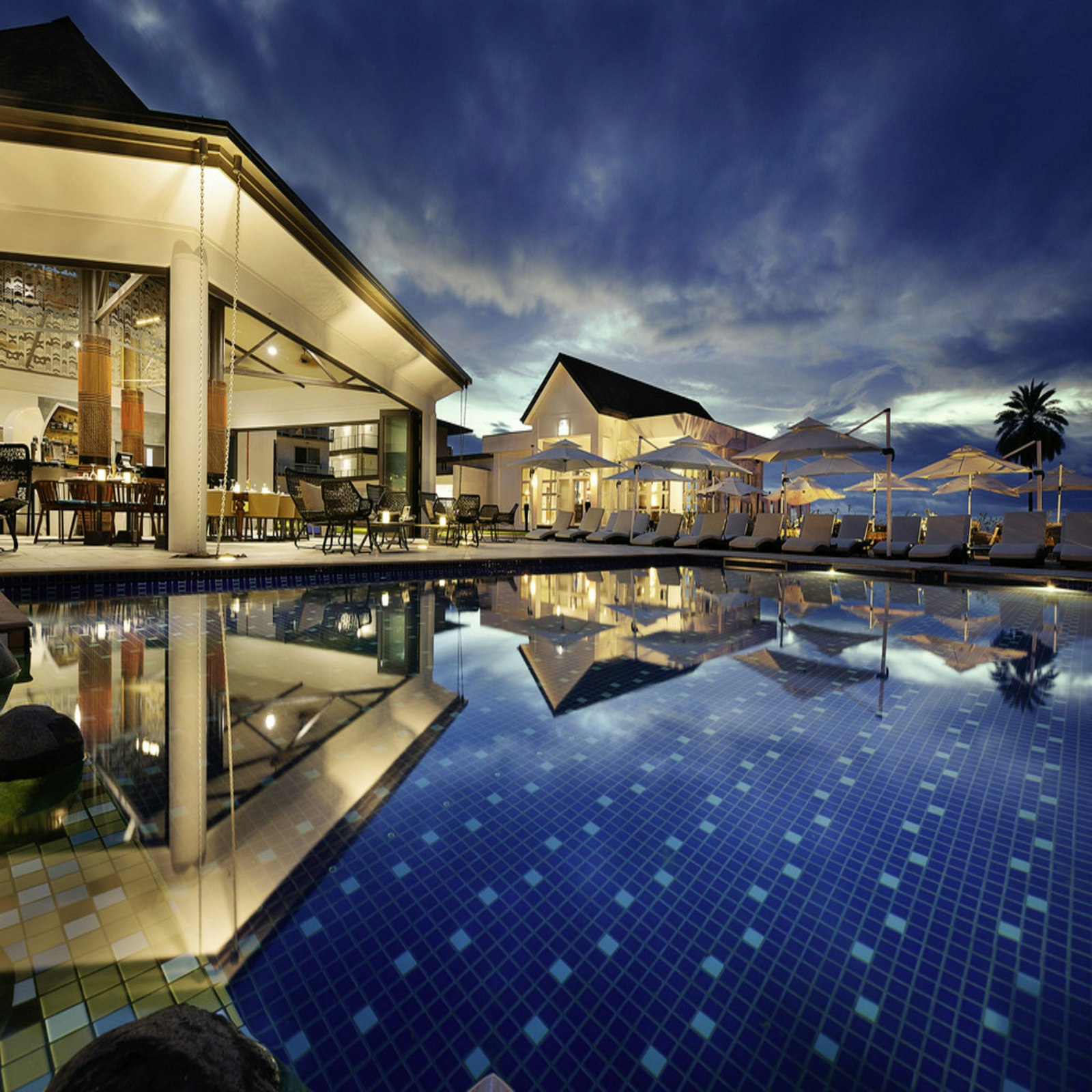 Pool illuminated at dusk